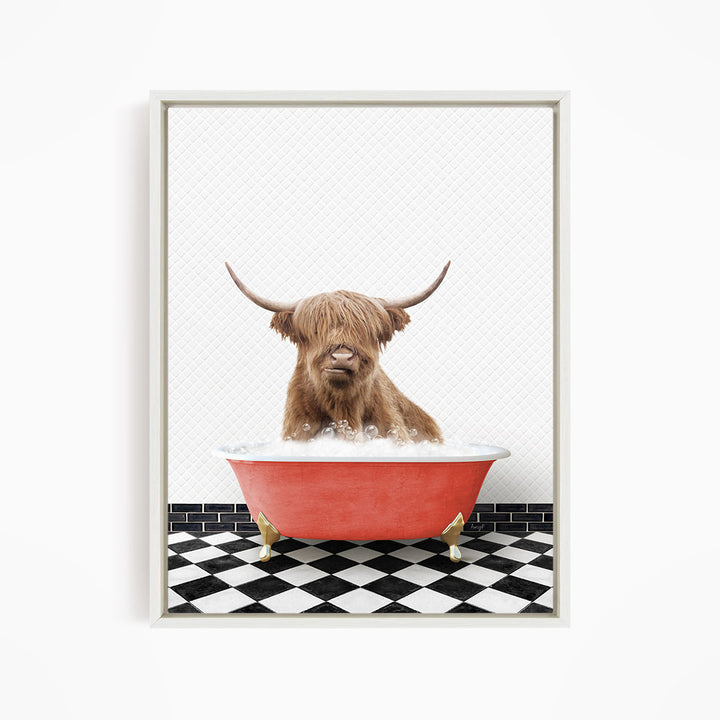 A brown cow with long horns is sitting in a red bathtub filled with water, creating a whimsical and playful scene.