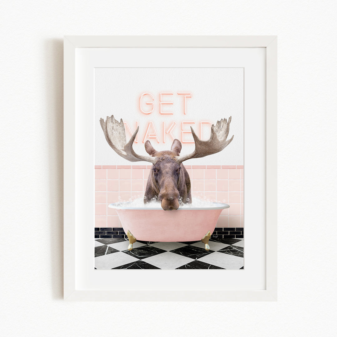 A framed image depicting a moose in a pink bathtub with the text "GET NAKED" written above it.
