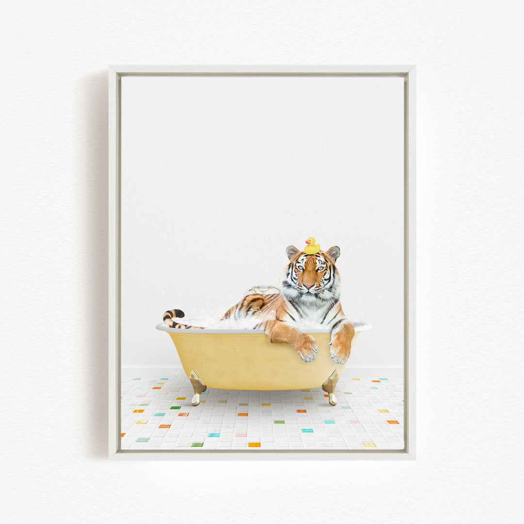 A tiger is sitting in a yellow bathtub, wearing a yellow crown and looking directly at the camera.