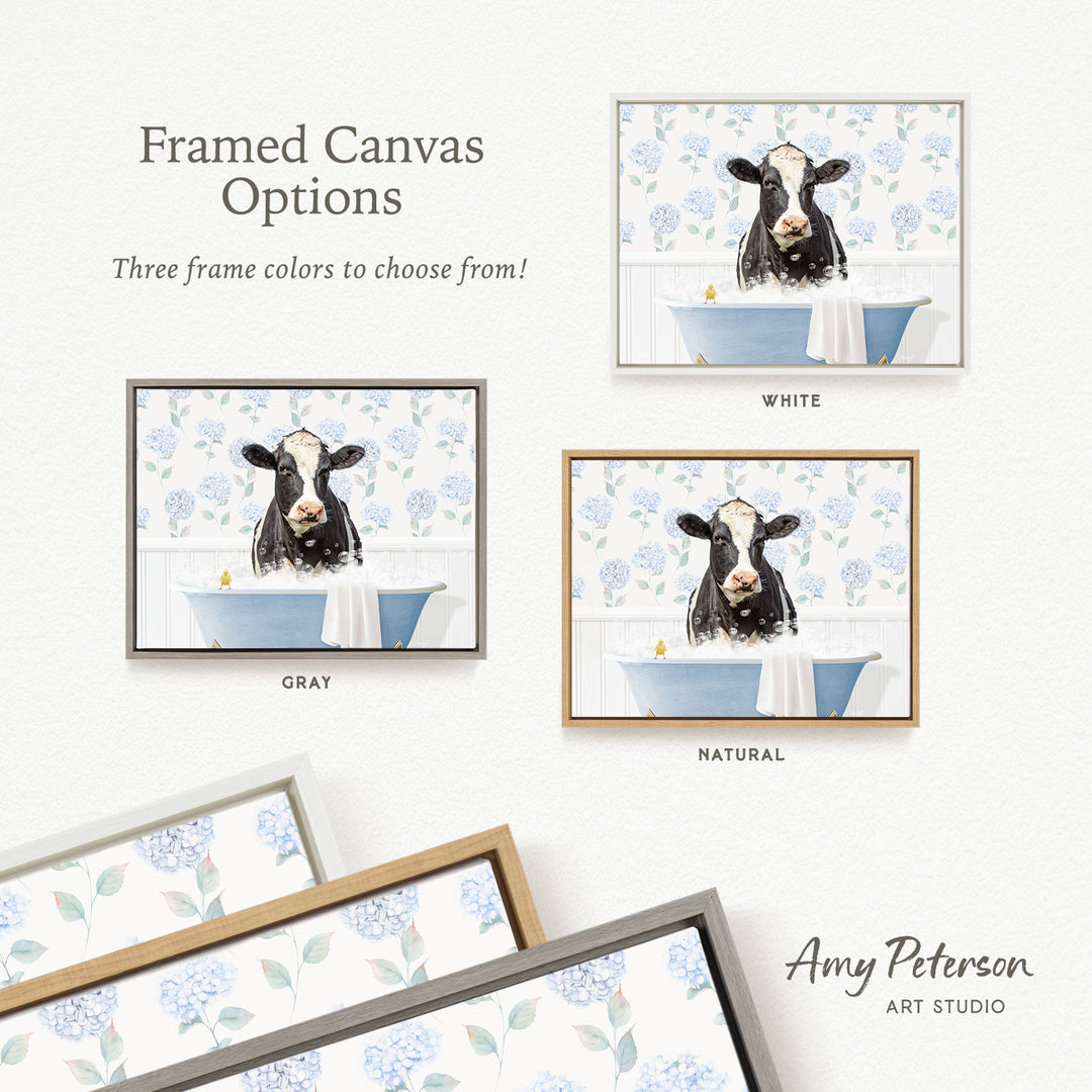The image is a framed canvas with three different options for the color of the frame: white, gray, and natural. The cow image is displayed in each frame, and the text provides information about the frame colors available.