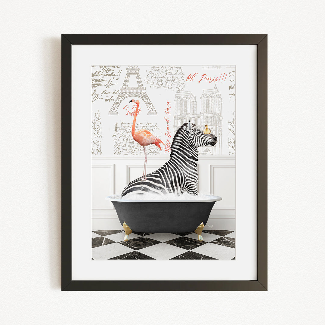 A framed image depicting a zebra sitting in a bathtub, with a pink flamingo perched on its back. The background features a black and white checkered floor and the Eiffel Tower.