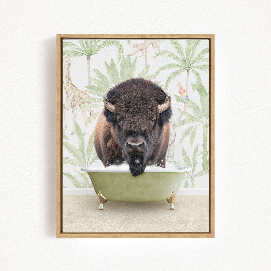 A buffalo with a black mane and horns is sitting in a green bathtub, surrounded by tropical foliage and animals.