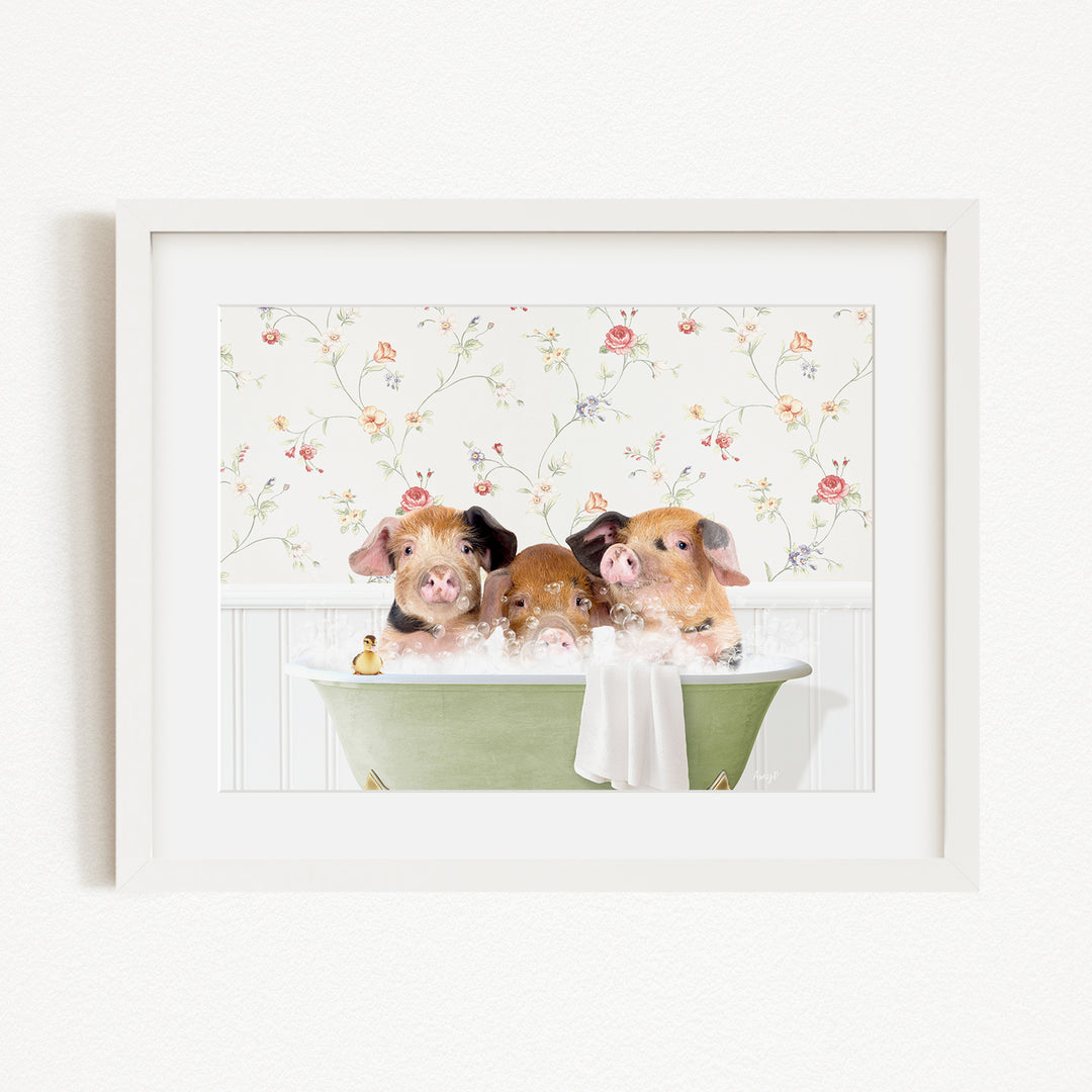 Three adorable pigs sitting in a green bathtub, enjoying a relaxing bath.