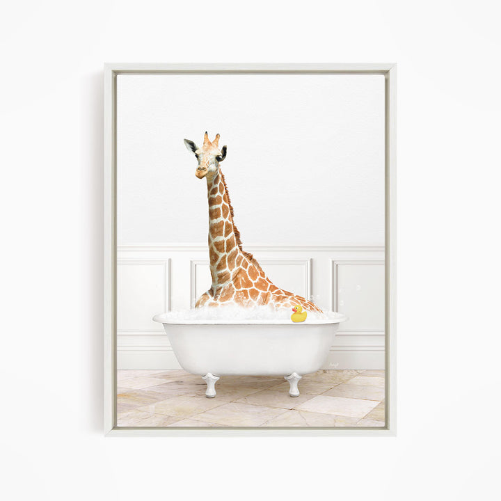 A giraffe is sitting in a white bathtub filled with water, surrounded by a yellow rubber duck.