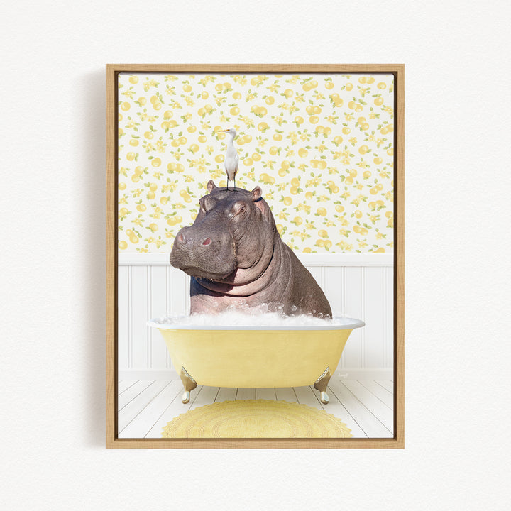 A hippopotamus sitting in a yellow bathtub, with a bird perched on its head.