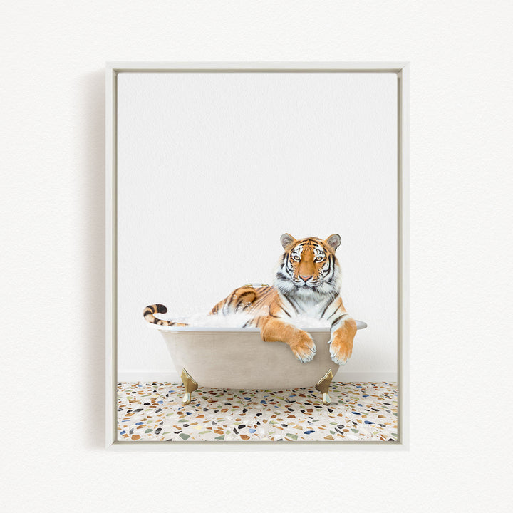 A tiger is sitting in a bathtub filled with water, appearing relaxed and comfortable.