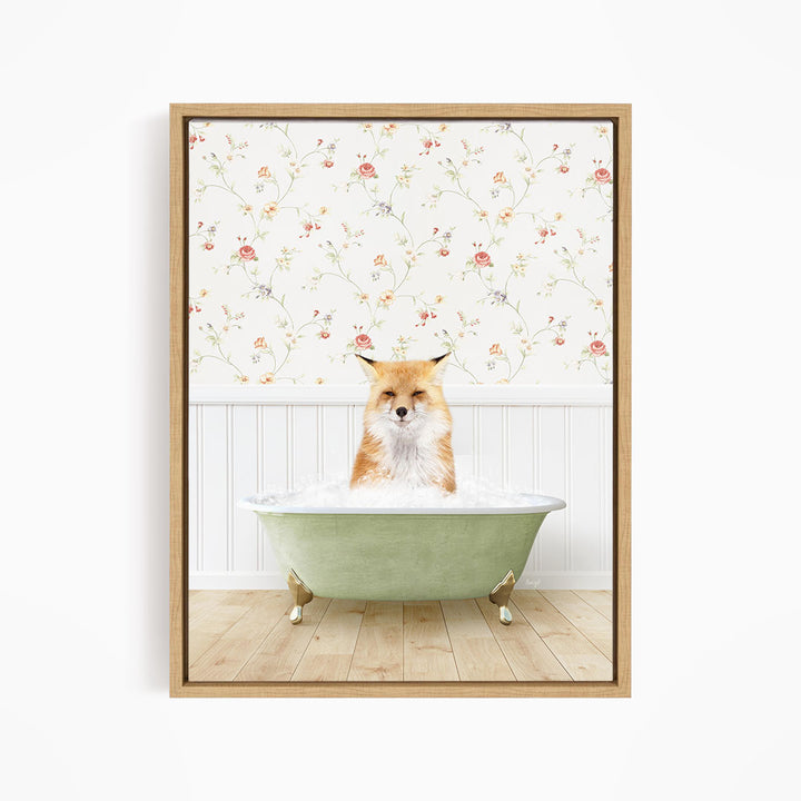 A fox is sitting in a green bathtub filled with water, with a floral wallpaper in the background.