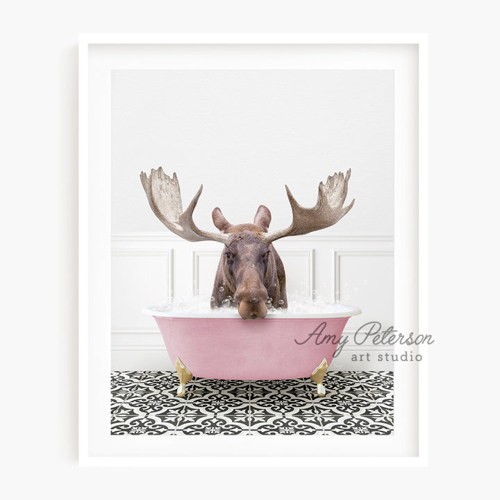 a moose in a bathtub with antlers on his head