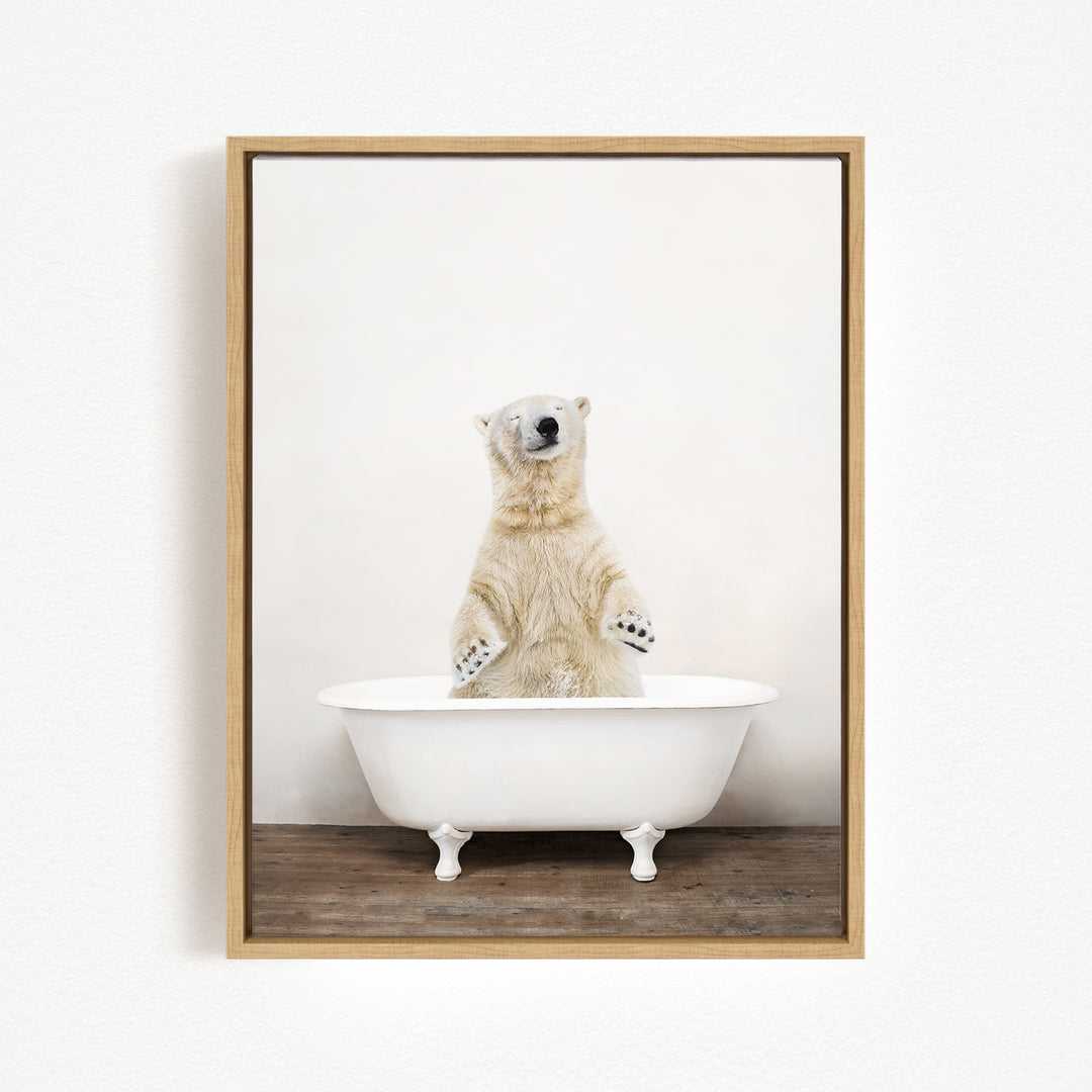 A polar bear standing in a white bathtub, with its paws raised in the air.