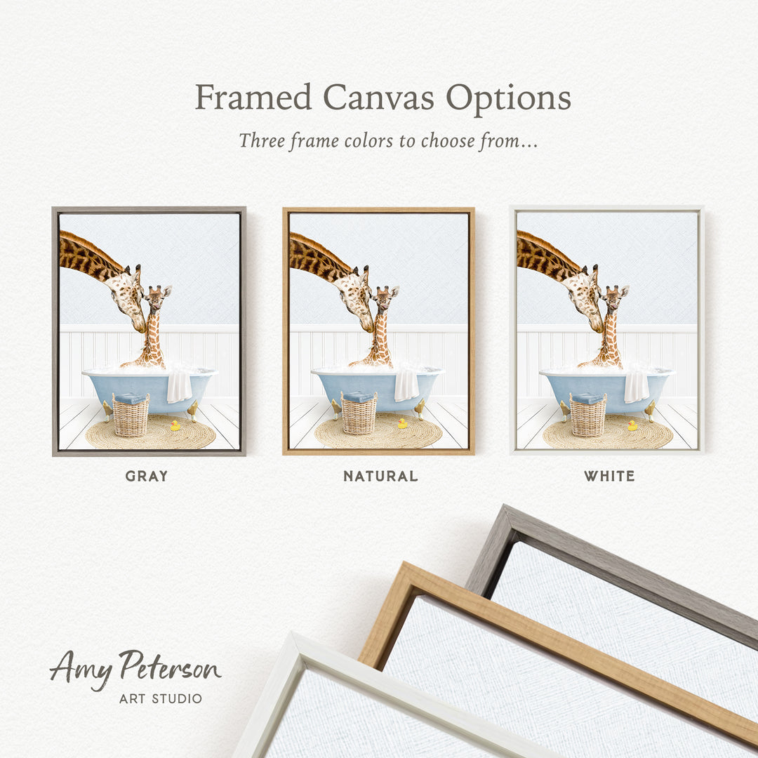 The image is a framed canvas option featuring three different colored frames, each containing a photograph of a giraffe in a bathtub.