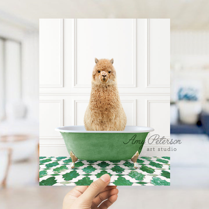 a hand holding a card with a picture of a llama in a bathtub