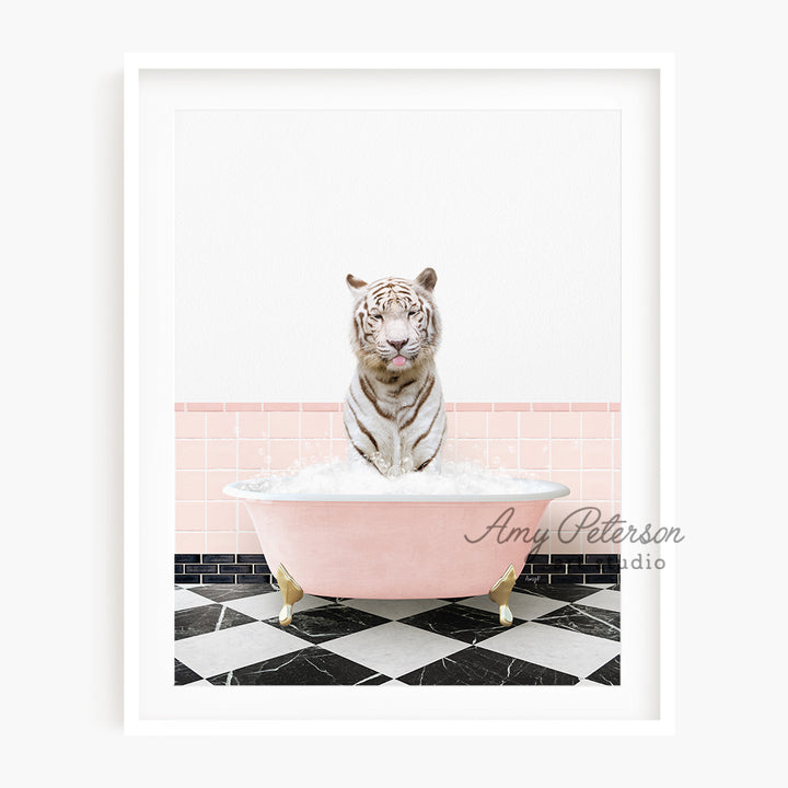 a white tiger sitting in a pink bath tub