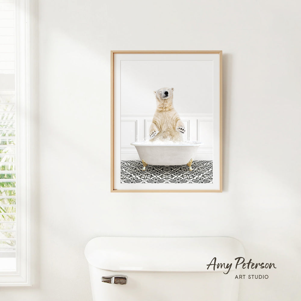 A polar bear sitting in a bathtub, with a black and white patterned tile floor beneath it.