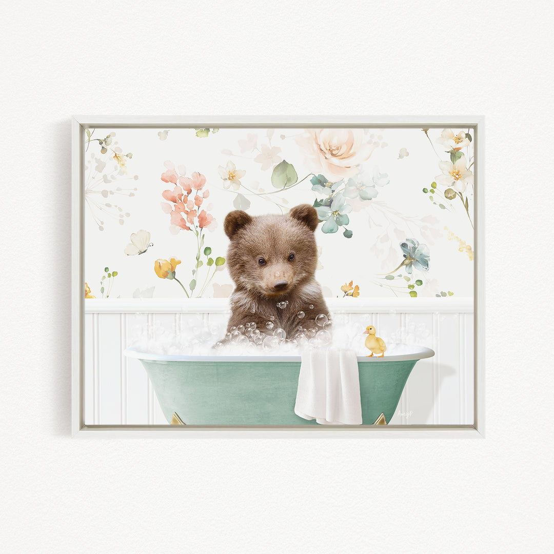 A cute brown bear sitting in a green bathtub filled with bubbles, surrounded by a floral wallpaper.