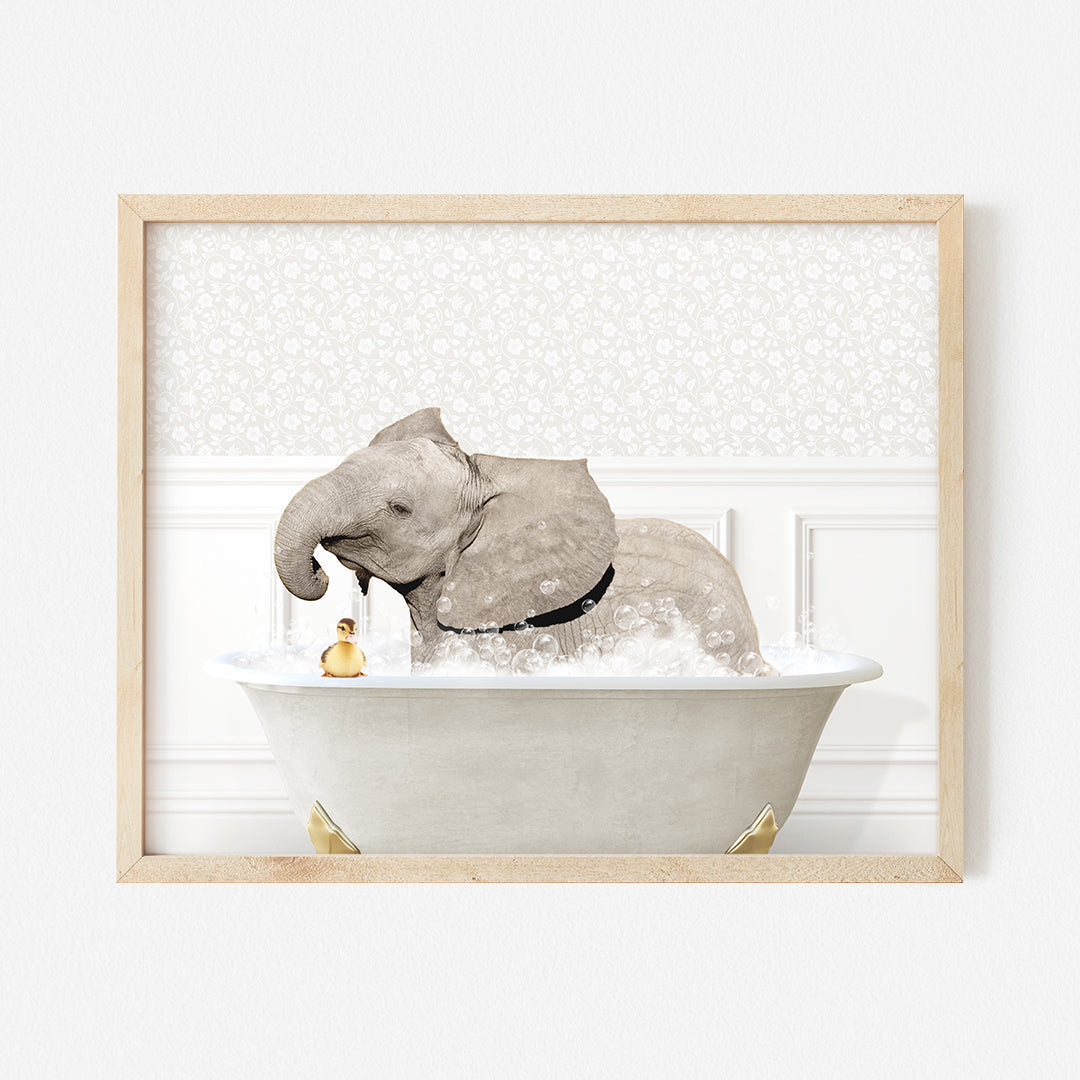 an elephant taking a bath in a bathtub