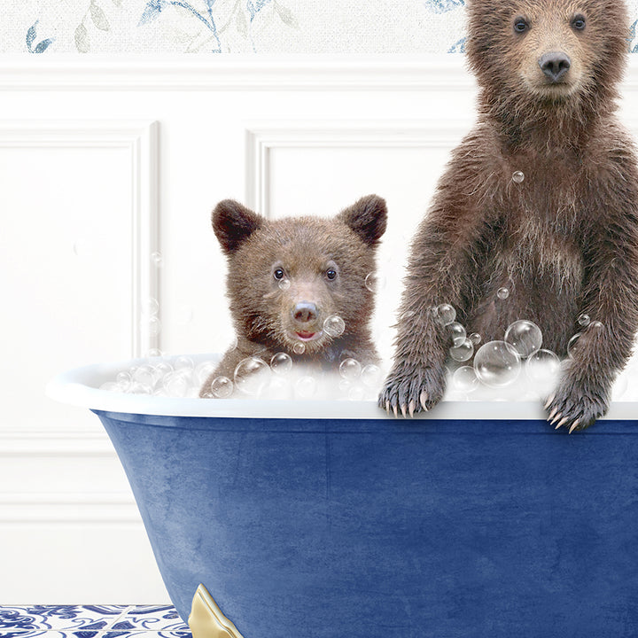 two brown bears are sitting in a bathtub