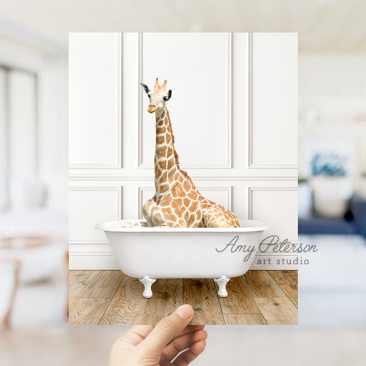 a giraffe sitting in a bathtub in a room