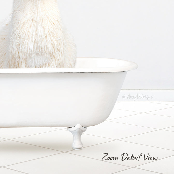 A fluffy white cat sitting in a white bathtub, with a tiled floor in the background.
