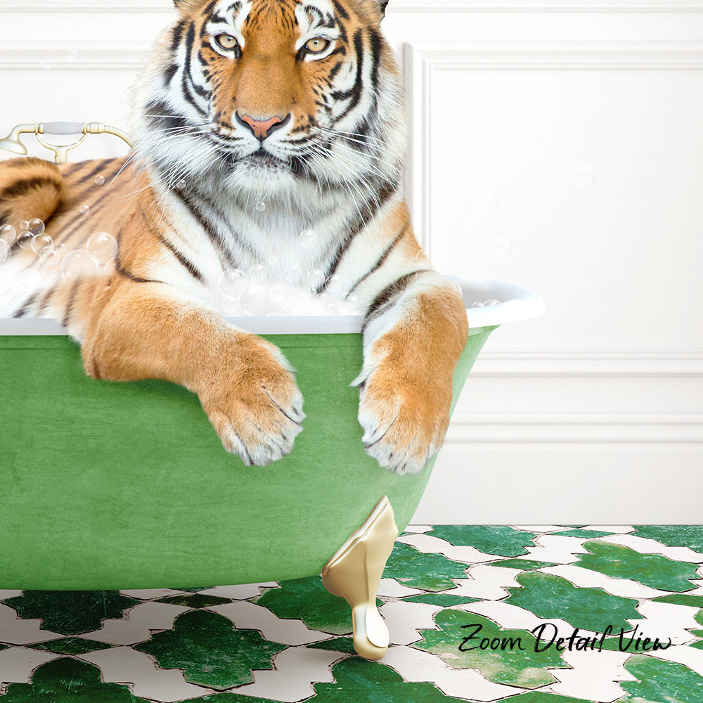 A tiger is sitting in a green bathtub, with its paws resting on the side of the tub.
