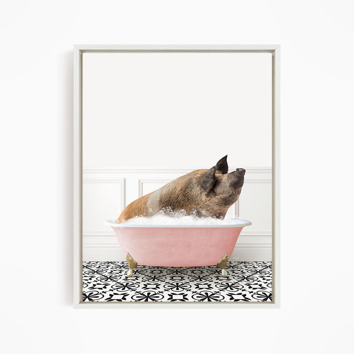 A pig sitting in a pink bathtub filled with bubbles, looking up at the camera.