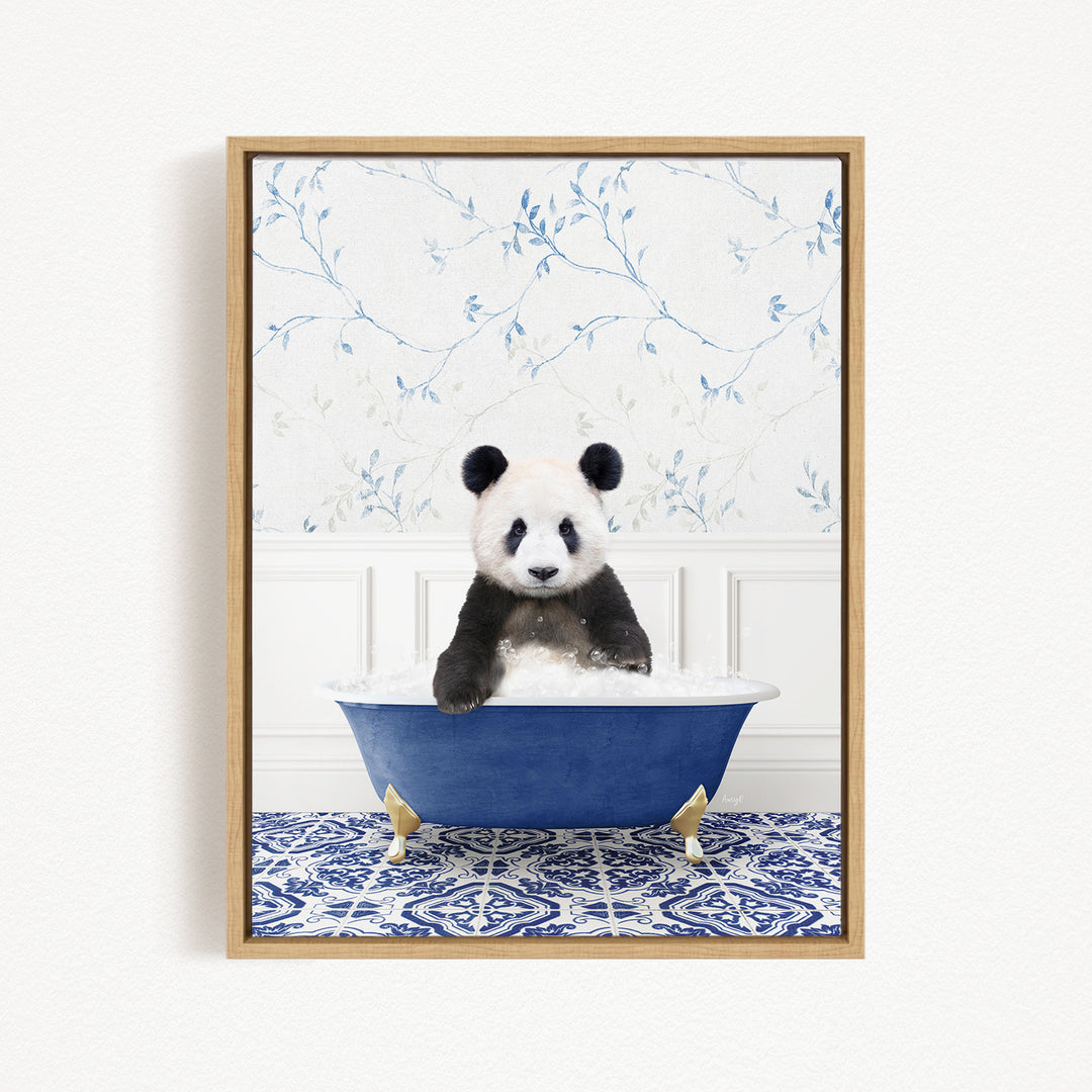A panda bear sitting in a blue bathtub, surrounded by a blue and white floral patterned wall.