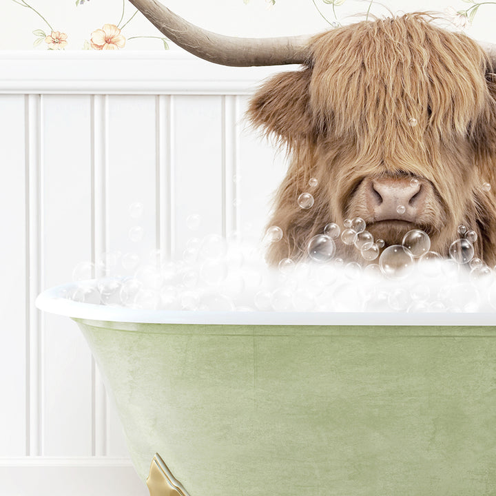 a bull with long horns sitting in a bathtub filled with bubbles