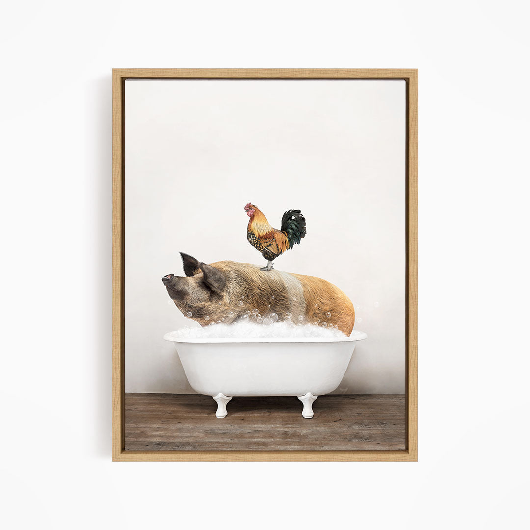 A rooster stands on a pig's back while the pig is sitting in a white bathtub filled with water.