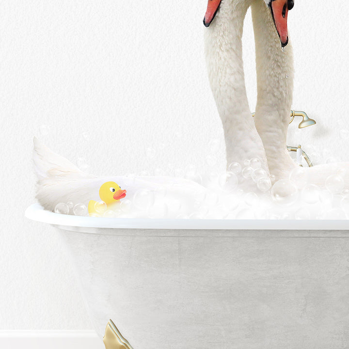 a white swan in a bathtub with a rubber duck