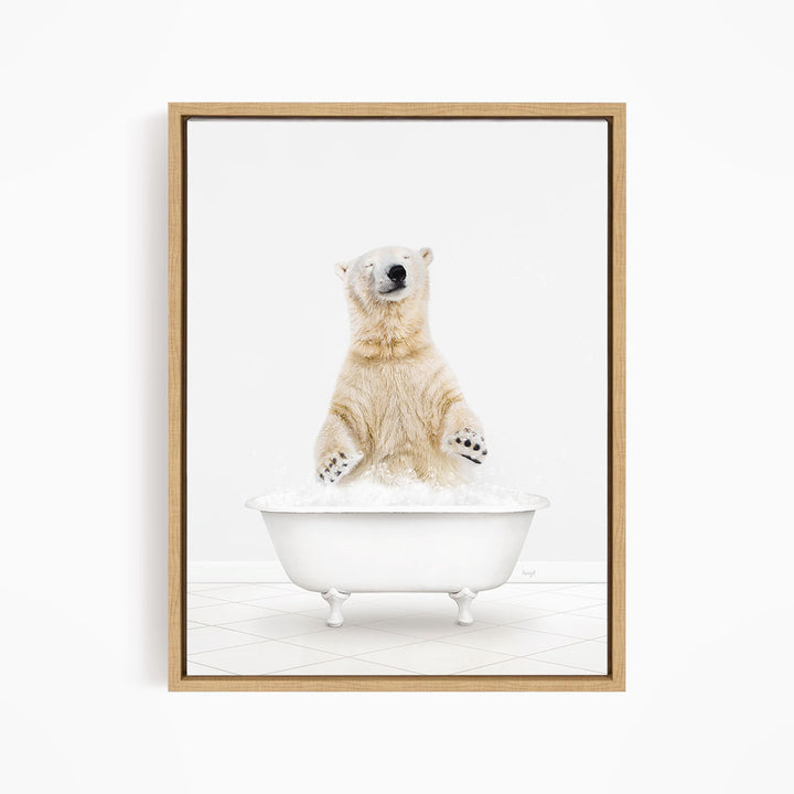 A polar bear standing in a white bathtub filled with water, appearing to be enjoying a bath.