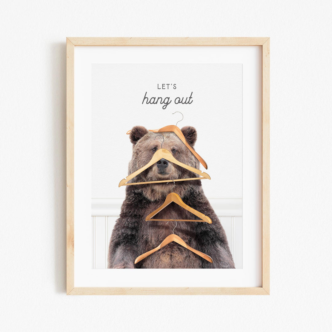 a picture of a bear with a hanger on it's head