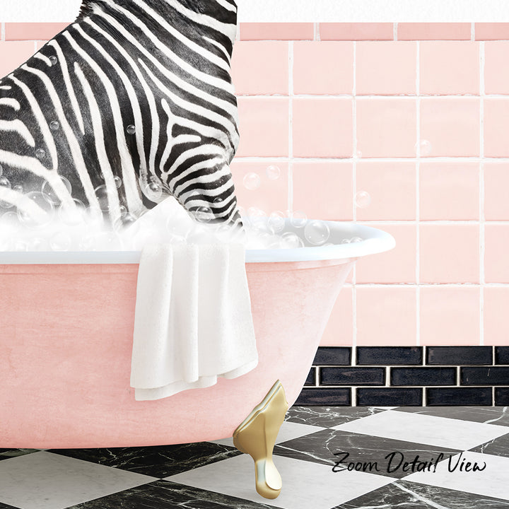 A zebra standing in a pink bathtub filled with bubbles, with a towel hanging on the side and a gold shoe visible at the bottom of the tub.