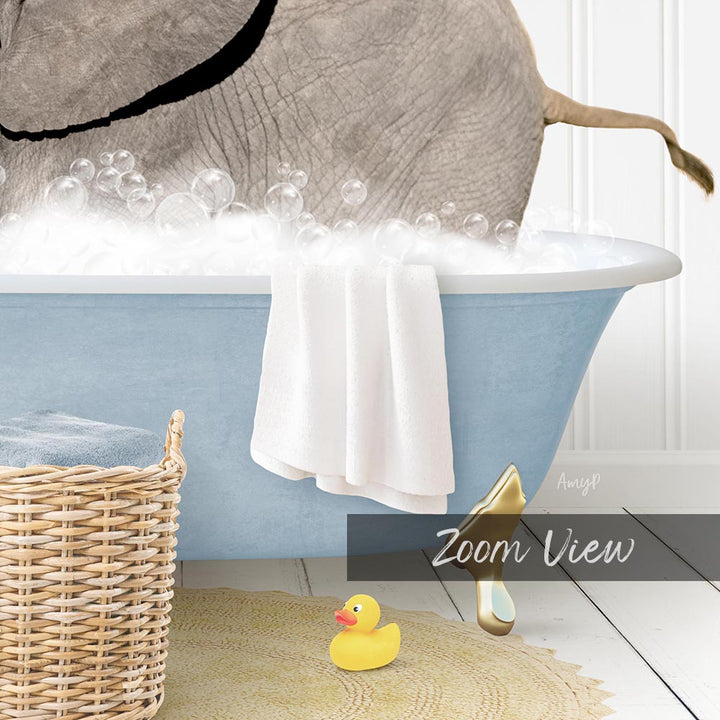 A blue bathtub filled with bubbles, with a white towel hanging on the side and a yellow rubber duck nearby.