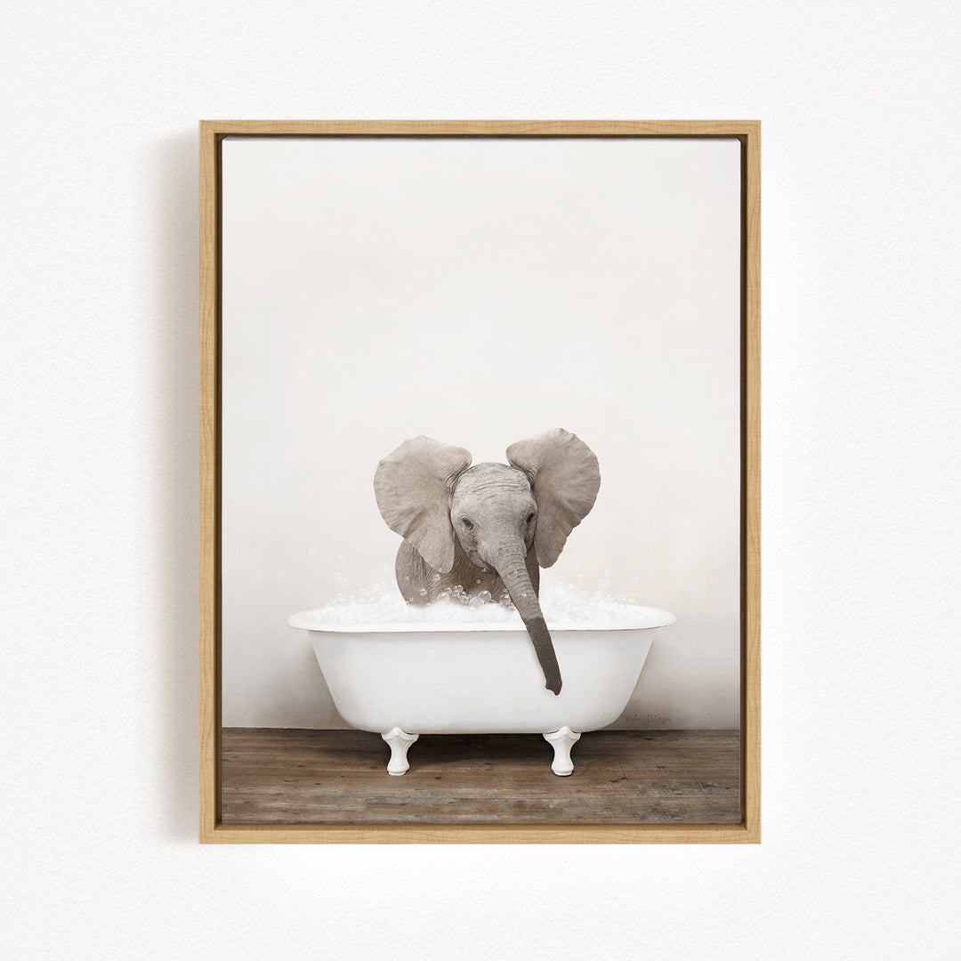 A baby elephant sitting in a white bathtub filled with water, creating a playful and whimsical scene.
