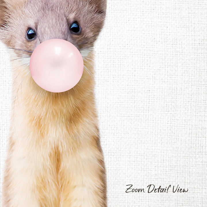 A close-up of a small animal, possibly a rodent or a cat, blowing a bubble with a pink bubble gum bubble.