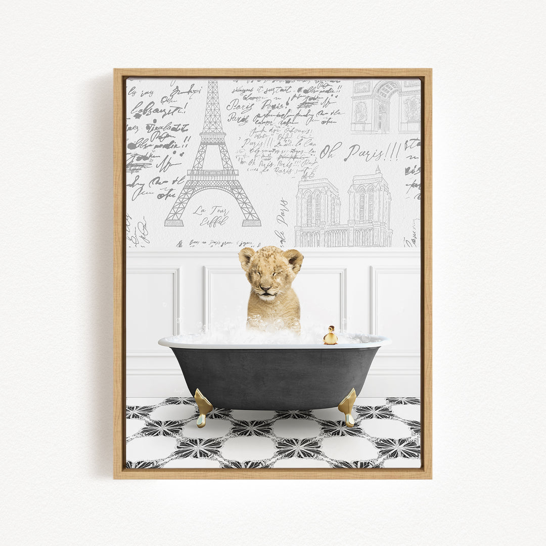 A young lion cub sitting in a bathtub filled with water, surrounded by a Paris-themed background with the Eiffel Tower and other Parisian landmarks.