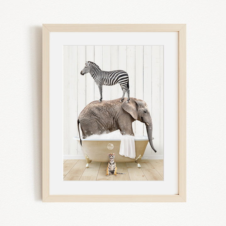A zebra stands on the back of an elephant, which is sitting in a bathtub, with a tiger standing nearby.