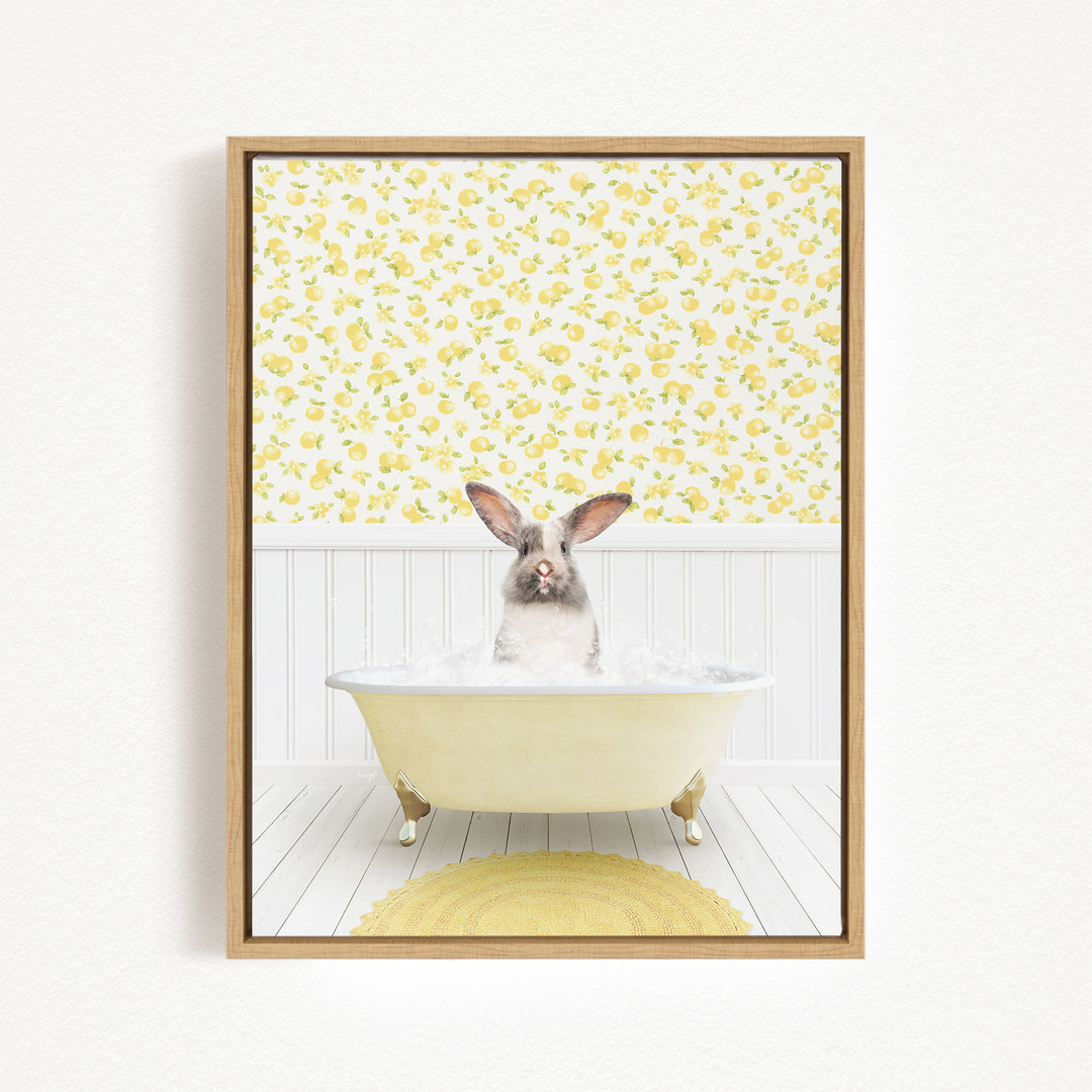 A white rabbit sitting in a yellow bathtub filled with bubbles, surrounded by a yellow rug and a yellow and white floral wallpaper.