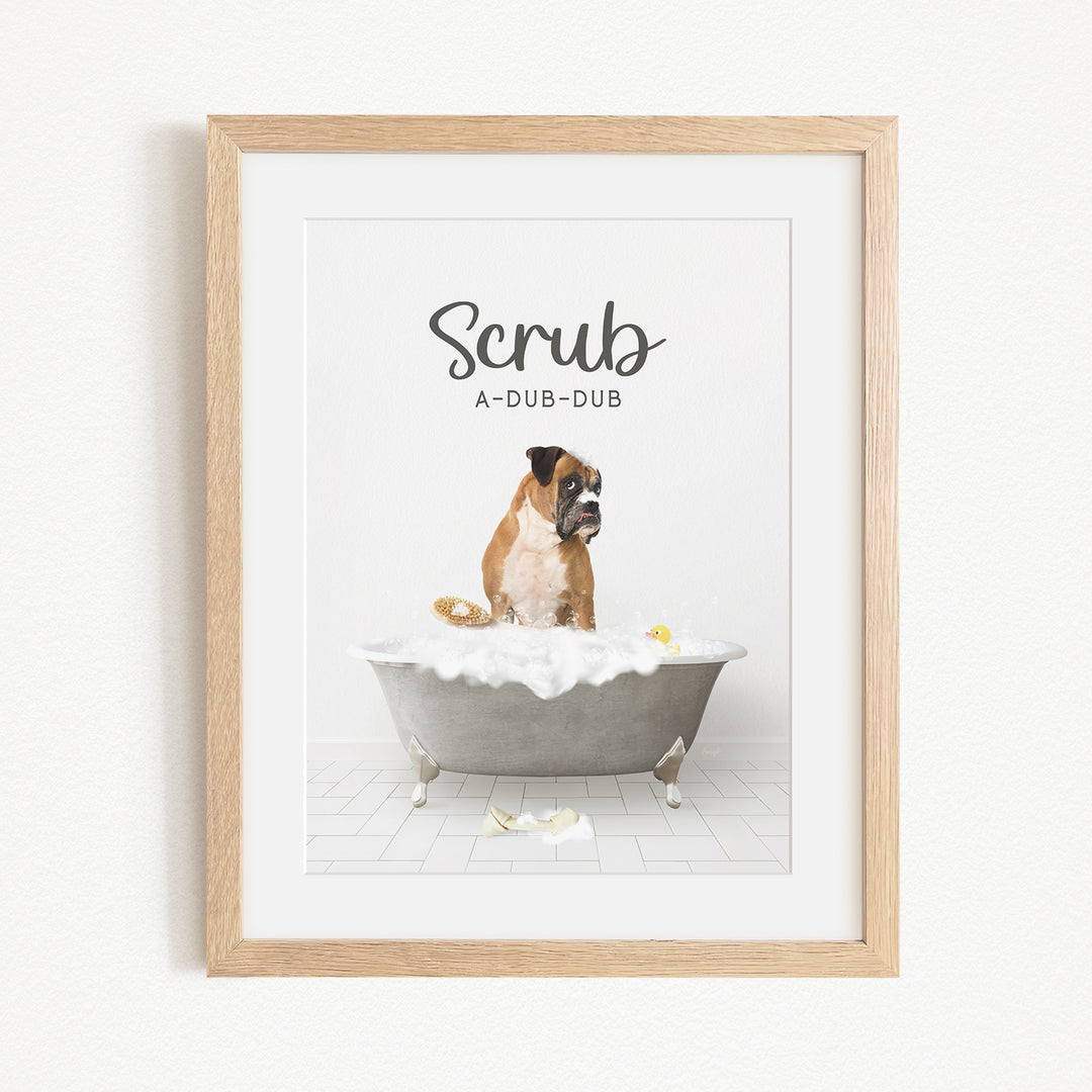 A dog sitting in a bathtub filled with bubbles, with the text "Scrub" and "A-DUB-DUB" written above it.