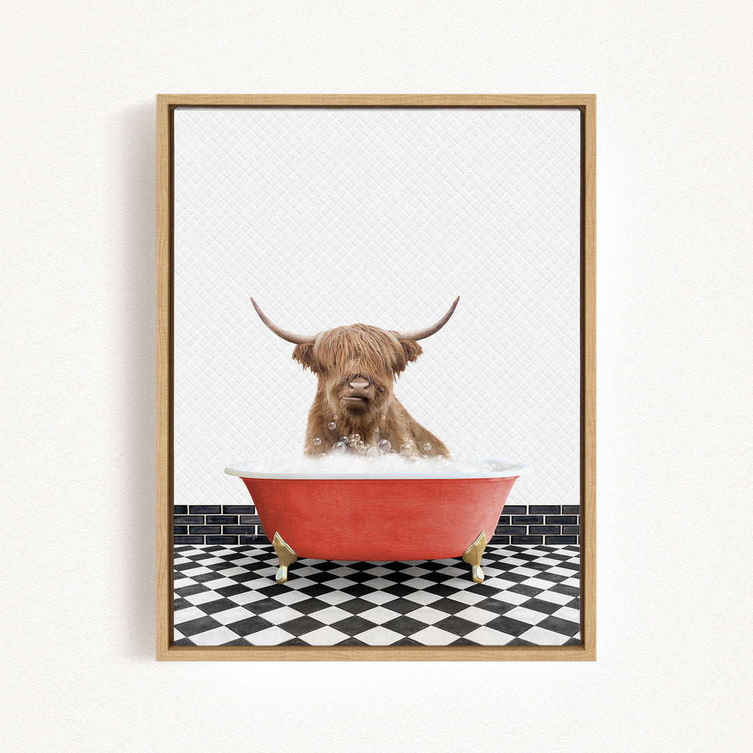 A brown cow with long horns is sitting in a red bathtub filled with bubbles, surrounded by a black and white checkered floor.