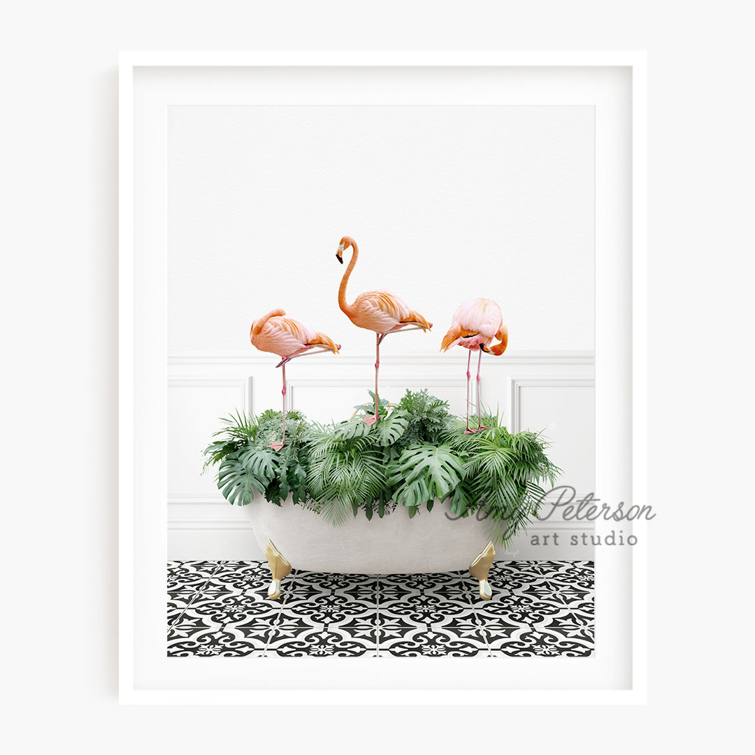 a group of pink flamingos sitting in a bathtub