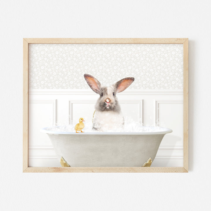 a picture of a bunny in a bathtub with a rubber duck