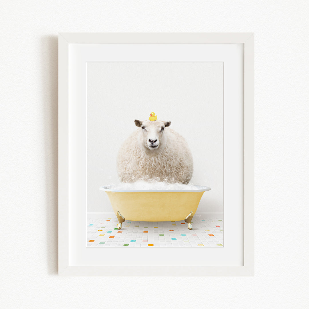 A fluffy white sheep sits in a yellow bathtub, with a yellow rubber duck perched on its head.
