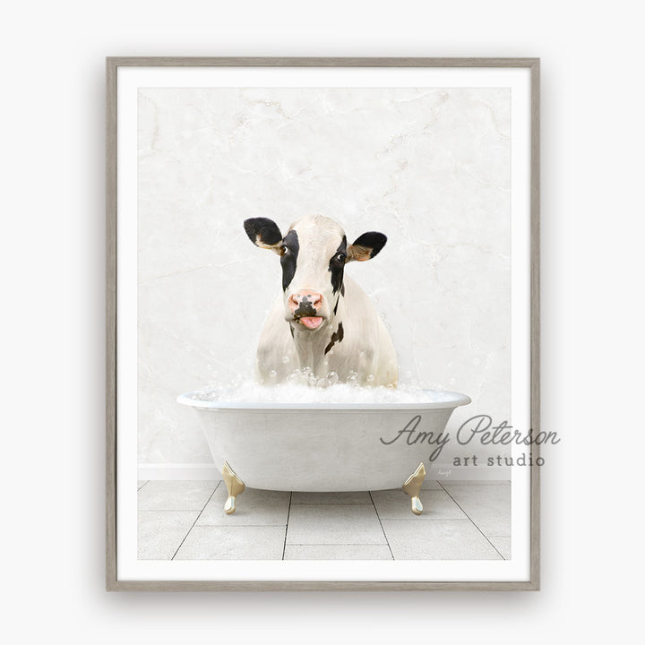 a cow sitting in a bathtub with its tongue out