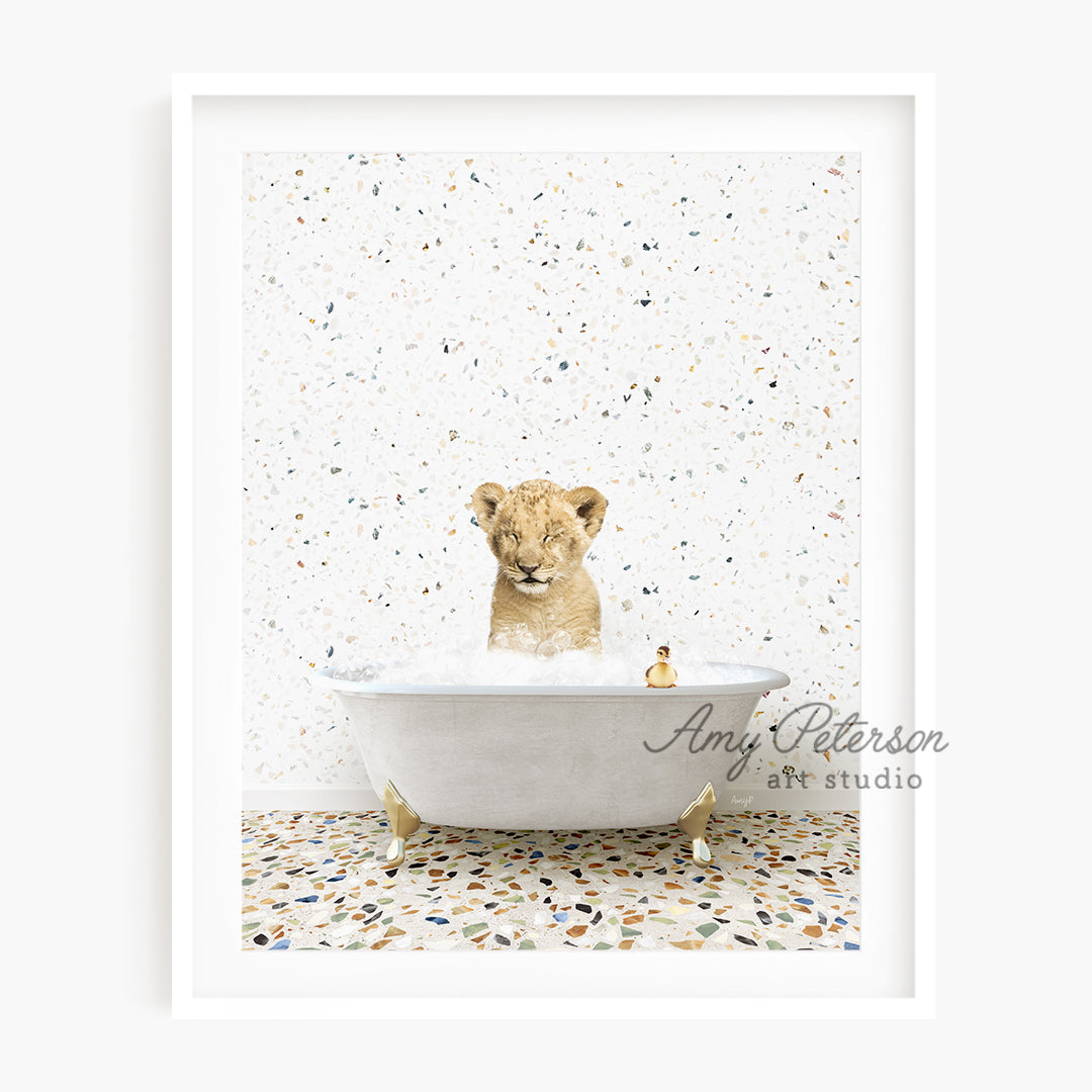 a picture of a lion cub in a bathtub