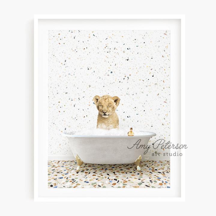 a picture of a lion cub in a bathtub