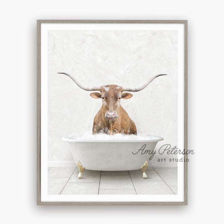 a cow is sitting in a bathtub with long horns