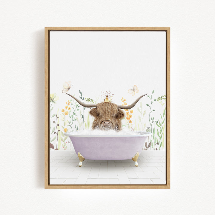 A framed illustration depicting a cow with long horns sitting in a bathtub filled with bubbles, surrounded by flowers and butterflies.