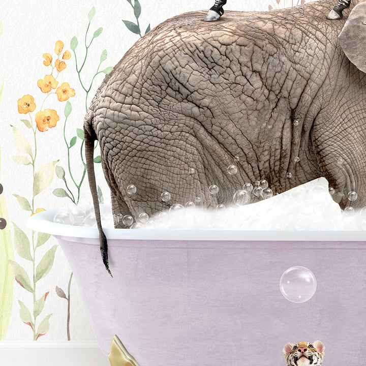 an elephant is taking a bath in a bathtub