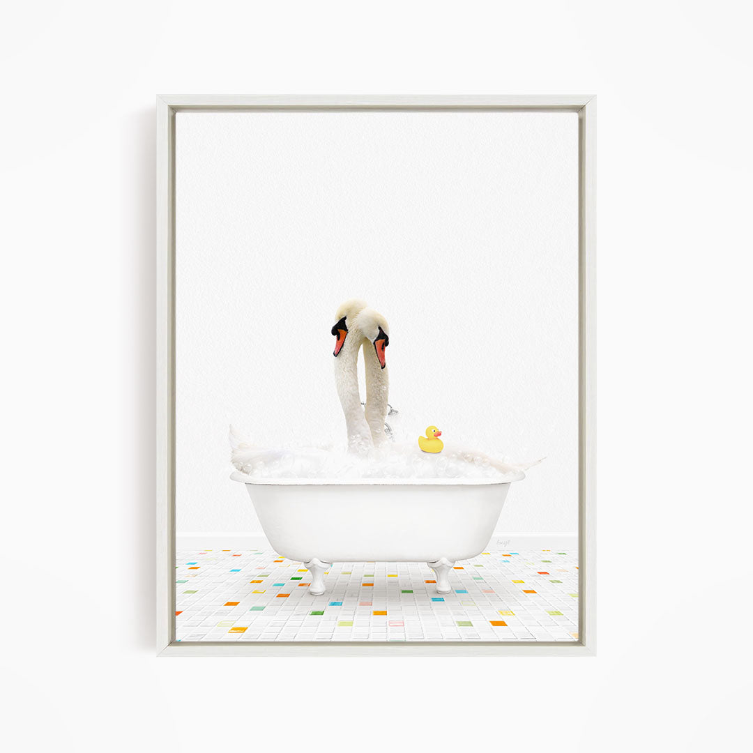 A white bathtub filled with bubbles, with two swans standing on the edge and a rubber duck floating in the water.