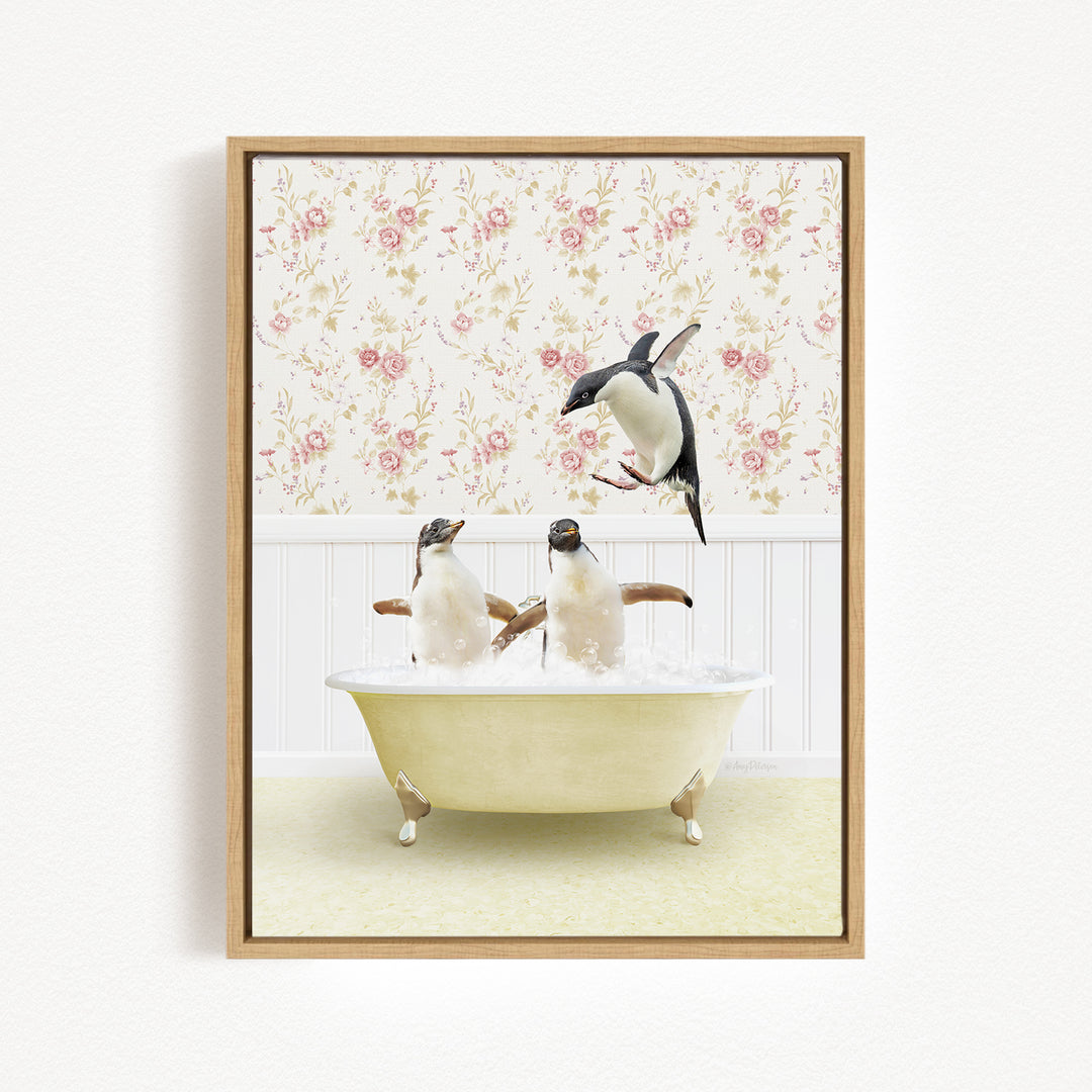 A framed image depicting two penguins sitting in a bathtub, with one penguin flying towards the other penguin.